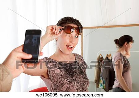Woman in a clothes shop View Large Photo Image Stock Photography - Woman in a clothes shop. Fotosearch