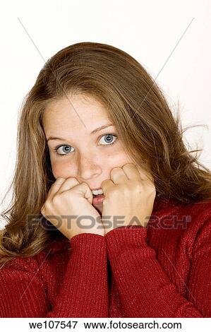 Woman looking afraid View Large Photo Image Stock Photo - Woman looking afraid. Fotosearch