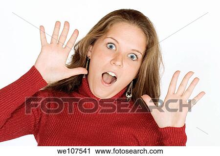 Stock Image - Woman looking surprised. Fotosearch