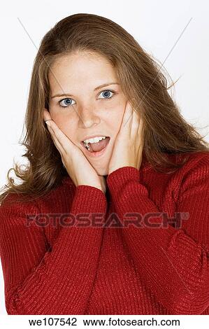 Stock Image - Woman looking surprised. Fotosearch
