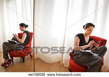 Woman working at home View Large Photo Image Stock Image - Woman working at home. Fotosearch