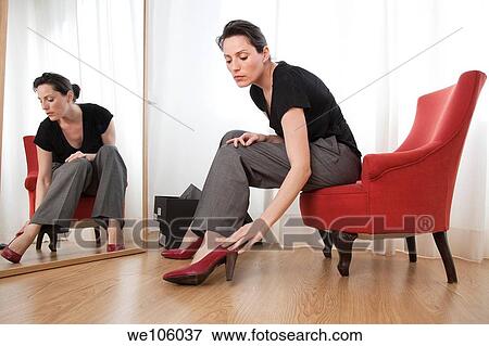 Women in a clothes shop View Large Photo Image Stock Photo - Women in a clothes shop. Fotosearch