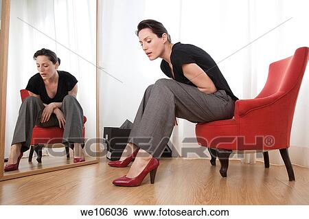 Women in a clothes shop View Large Photo Image Stock Photograph - Women in a clothes shop. Fotosearch
