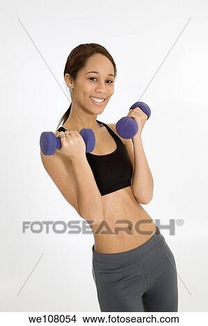Young African American woman working out View Large Photo Image Picture - Young African American woman working out. Fotosearch