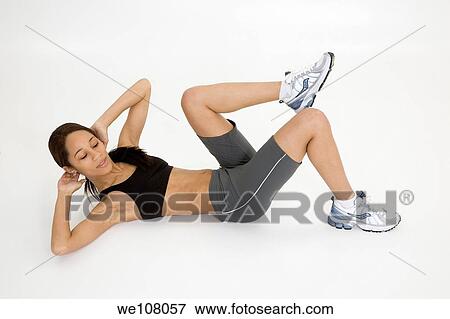 Young African American woman working out View Large Photo Image Stock Photo - Young African American woman working out. Fotosearch