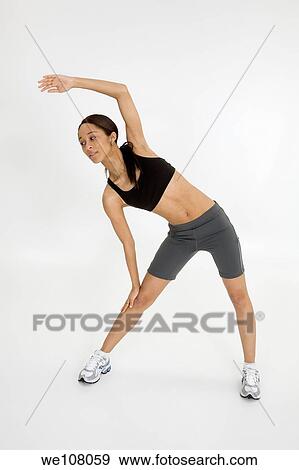 Young African American woman working out View Large Photo Image Stock Photo - Young African American woman working out. Fotosearch