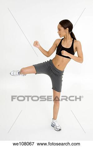 Young African American woman working out View Large Photo Image Stock Photo - Young African American woman working out. Fotosearch