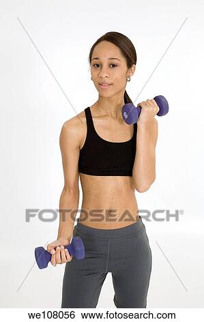 Young African American woman working out View Large Photo Image Stock Photograph - Young African American woman working out. Fotosearch