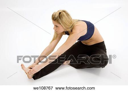 Young caucasian woman working out View Large Photo Image Stock Photo - Young caucasian woman working out. Fotosearch