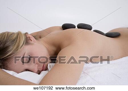 Young woman having a relaxing moment during a message View Large Photo Image Stock Image - Young woman having a relaxing moment during a message. Fotosearch