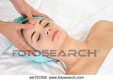 Young woman having a relaxing moment during a message View Large Photo Image Stock Image - Young woman having a relaxing moment during a message. Fotosearch
