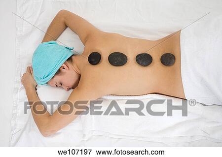 Young woman having a relaxing moment during a message View Large Photo Image Stock Photo - Young woman having a relaxing moment during a message. Fotosearch