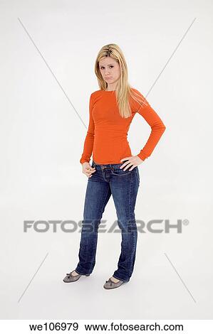Young woman posing on white background with some attitude View Large Photo Image Stock Photo - Young woman posing on white background with some attitude. Fotosearch