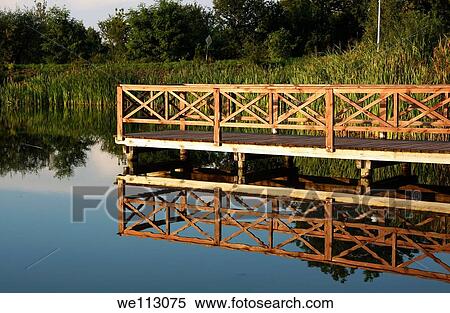 Stock Photography - A pond in Krzywda village Lukow county, Poland. Fotosearch