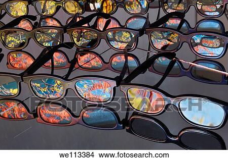 Collection of 3D glasses in dark room on mirrors reflecting screen projection of Fall scene View Large Photo Image Picture - Collection of 3D glasses in dark room on mirrors reflecting screen projection of Fall scene. Fotosearch