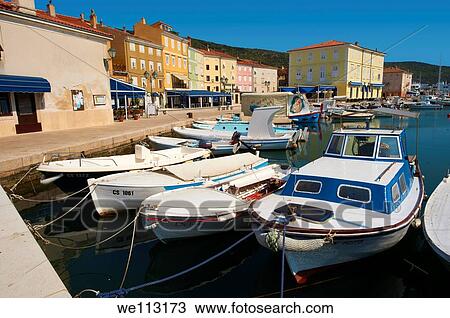 Cres old Town harbour with small local fising boats, Cres Island, Croatia View Large Photo Image Stock Image - Cres old Town harbour with small local fising boats, Cres Island, Croatia. Fotosearch