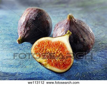 Stock Image - Fresh whole & cut figs. Fotosearch