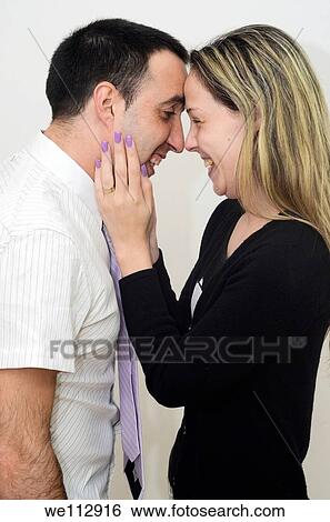 Hugging young couple View Large Photo Image Stock Photograph - Hugging young couple. Fotosearch