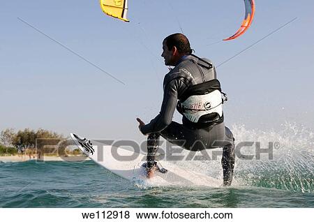 Kitesurfing in the Mediterranean sea Photographed from within the water View Large Photo Image Stock Photo - Kitesurfing in the Mediterranean sea Photographed from within the water. Fotosearch