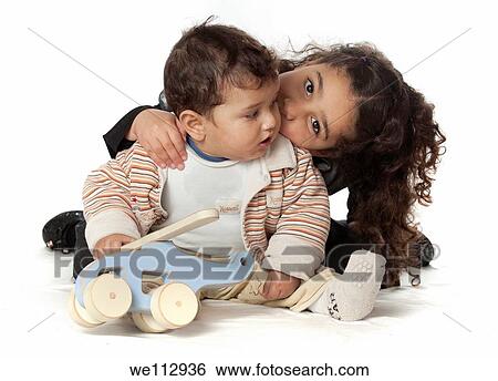 siblings love Sister of five and brother of two showing affection On white Background View Large Photo Image Stock Photograph - siblings love Sister of five and brother of two showing affection On white Background. Fotosearch