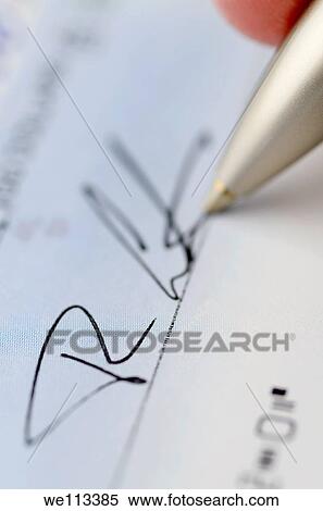 Vertical close up of pen signing a cheque with microprint security features View Large Photo Image Stock Photography - Vertical close up of pen signing a cheque with microprint security features. Fotosearch