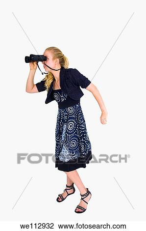Young business woman looking at the future with binoculars On white Background View Large Photo Image Stock Image - Young business woman looking at the future with binoculars On white Background. Fotosearch