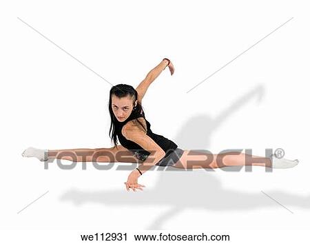 young female gymnast does the splits View Large Photo Image Stock Image - young female gymnast does the splits. Fotosearch