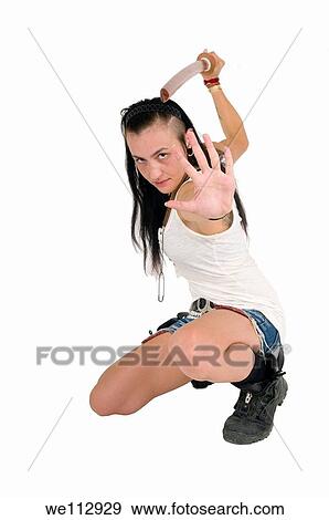 Young punk teen girl wielding a bokken a wooden Japanese sword used for practice View Large Photo Image Stock Photo - Young punk teen girl wielding a bokken a wooden Japanese sword used for practice. Fotosearch