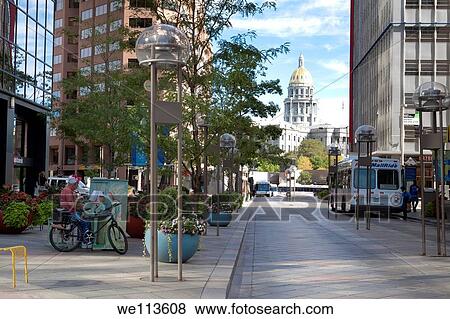 16th Street Mall in downtown Denver, Colorado with state capitol building and man playing painted piano on sidewalk View Large Photo Image Stock Photo - 16th Street Mall in downtown Denver, Colorado with state capitol building and man playing painted piano on sidewalk. Fotosearch
