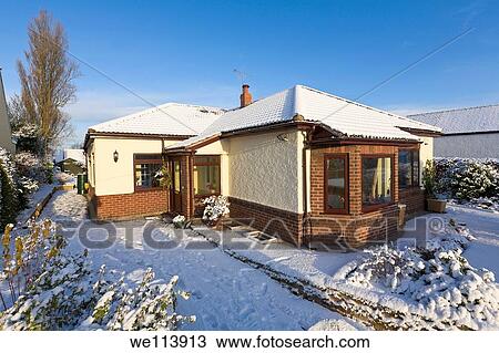 Bungalow in winter snow, Wirral, Merseyside, England View Large Photo Image Stock Image - Bungalow in winter snow, Wirral, Merseyside, England. Fotosearch
