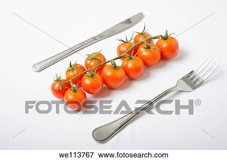 Cherry Tomatoes On white Background View Large Photo Image Stock Photo - Cherry Tomatoes On white Background. Fotosearch
