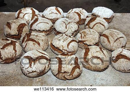 Stock Photograph - Freshly baked Valaisian rye breads, Erschmatt, Valais, Switzerland. Fotosearch