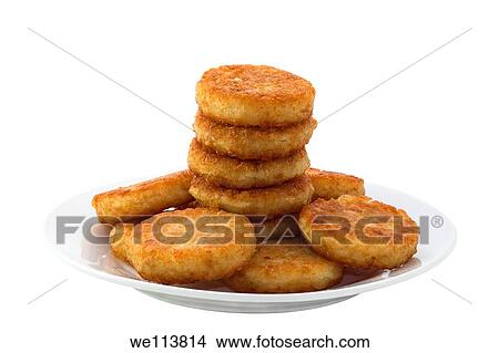 Hash browns on white plate Image is isolated on white background with clipping path View Large Photo Image Picture - Hash browns on white plate Image is isolated on white background with clipping path. Fotosearch