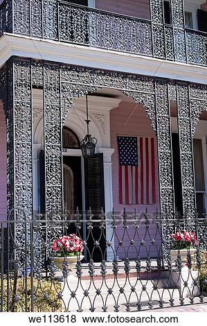 Stock Photo - Intricate wrought iron balcony railing of Musson House in Garden District of New Orleans. Fotosearch