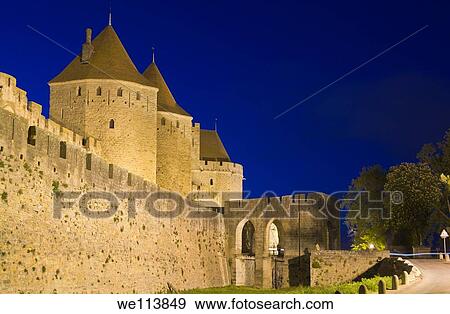 Stock Photo - Medieval old city and walls at night, Carcassonne, Aude, Languedoc Roussillon, France. Fotosearch