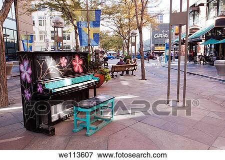 Painted piano on 16th Street Mall in downtown Denver, Colorado, part of the Your Keys to the City public art program View Large Photo Image Stock Photo - Painted piano on 16th Street Mall in downtown Denver, Colorado, part of the Your Keys to the City public art program. Fotosearch