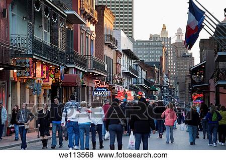 People cruising along bars and nightclubs on Bourbon Street at night in New Orleans View Large Photo Image Stock Photo - People cruising along bars and nightclubs on Bourbon Street at night in New Orleans. Fotosearch