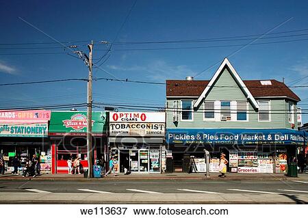Storefronts and vernacular architecture in Rockaway, New York City View Large Photo Image Stock Photo - Storefronts and vernacular architecture in Rockaway, New York City. Fotosearch