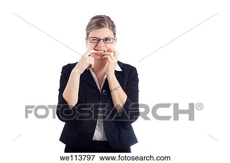 Stressed woman biting her nails, isolated on white background View Large Photo Image Stock Photo - Stressed woman biting her nails, isolated on white background. Fotosearch