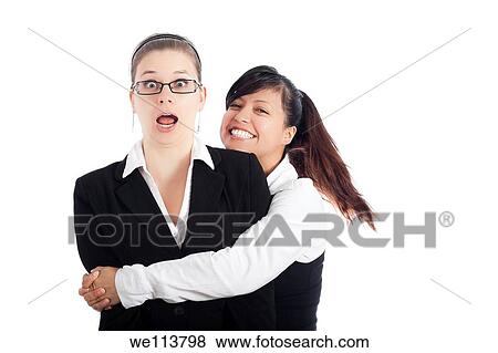 Two excited happy business women humorous moment, isolated on white background View Large Photo Image Stock Photo - Two excited happy business women humorous moment, isolated on white background. Fotosearch