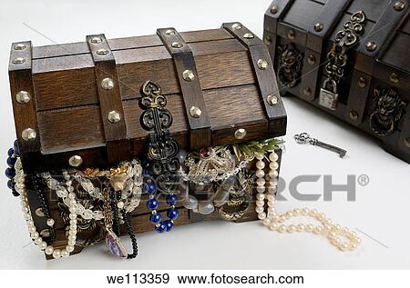 Stock Photo - Two treasure chests one open and overflowing with riches of pearls and jewels. Fotosearch