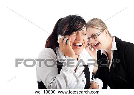 Stock Image - Two young happy business women on the phone, isolated on white background with copy space. Fotosearch