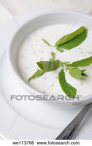 Tzatziki dip Greek yoghurt, cucumber, mint and garlic View Large Photo Image Stock Photograph - Tzatziki dip Greek yoghurt, cucumber, mint and garlic. Fotosearch