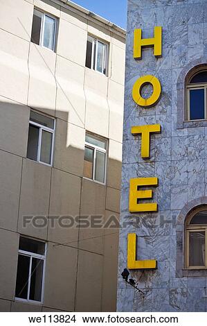 Yellow letters of hotel sign View Large Photo Image Picture - Yellow letters of hotel sign. Fotosearch
