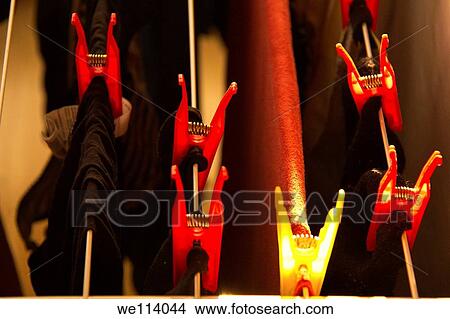 Clothes hanging and drying View Large Photo Image Picture - Clothes hanging and drying. Fotosearch