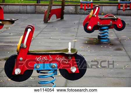 Motorbikes on a kindergarden View Large Photo Image Picture - Motorbikes on a kindergarden. Fotosearch