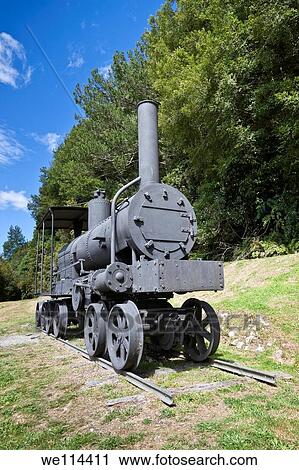 Stock Image - Old train in forest. South Island, New Zealand.. Fotosearch