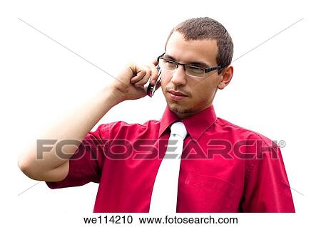 Stock Image - Portrait of young confident businessman phone call. Fotosearch