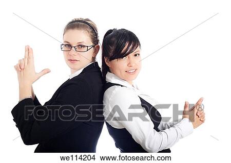 Successful business women team posing, isolated on white background View Large Photo Image Picture - Successful business women team posing, isolated on white background. Fotosearch