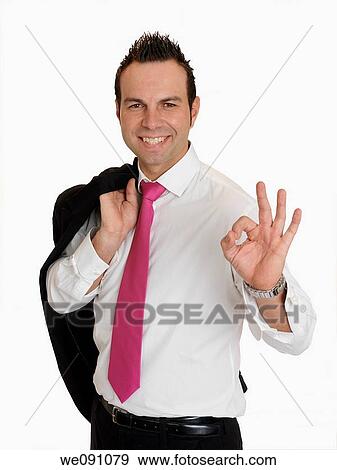 Stock Photo - Businessman making OK sign. Fotosearch